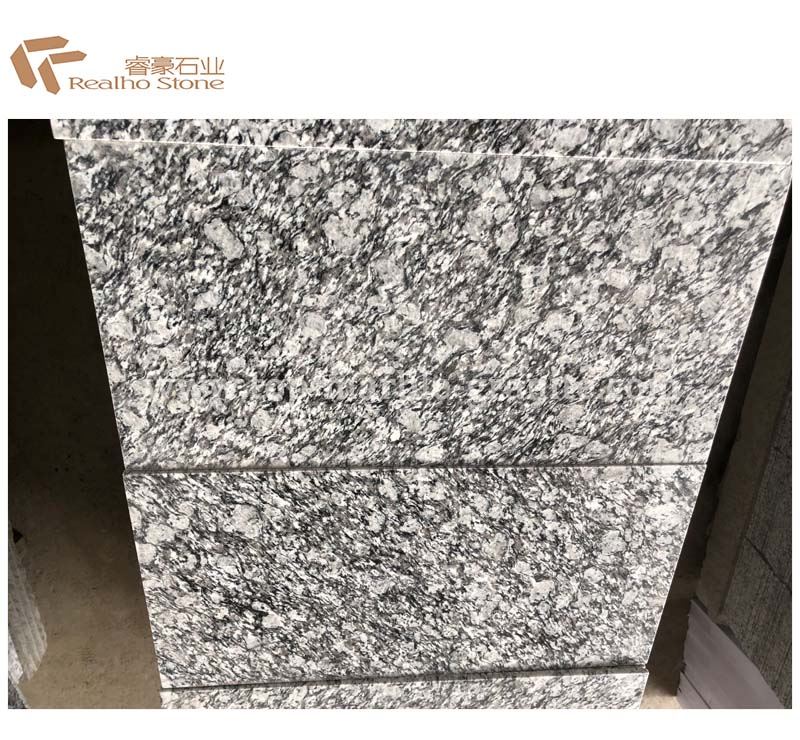 silver waves granite with white cabinets