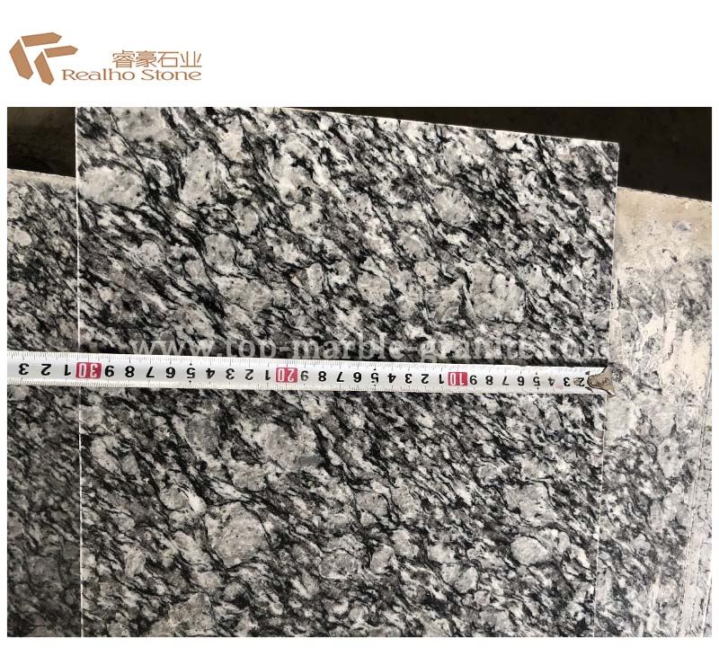 white wave granite countertop