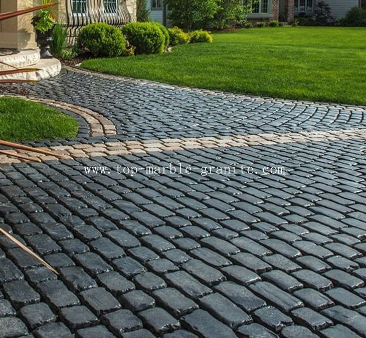 black cobblestone paving stones