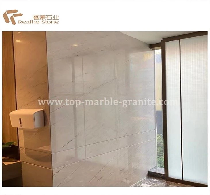 white marble tile bathroom